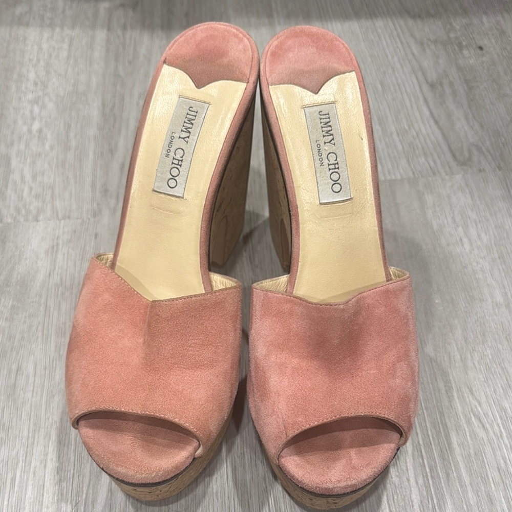 Pink suede Jimmy Choo wedges.